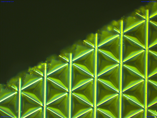 Inspection of retroreflector-pattern at 200x: recessed pyramids